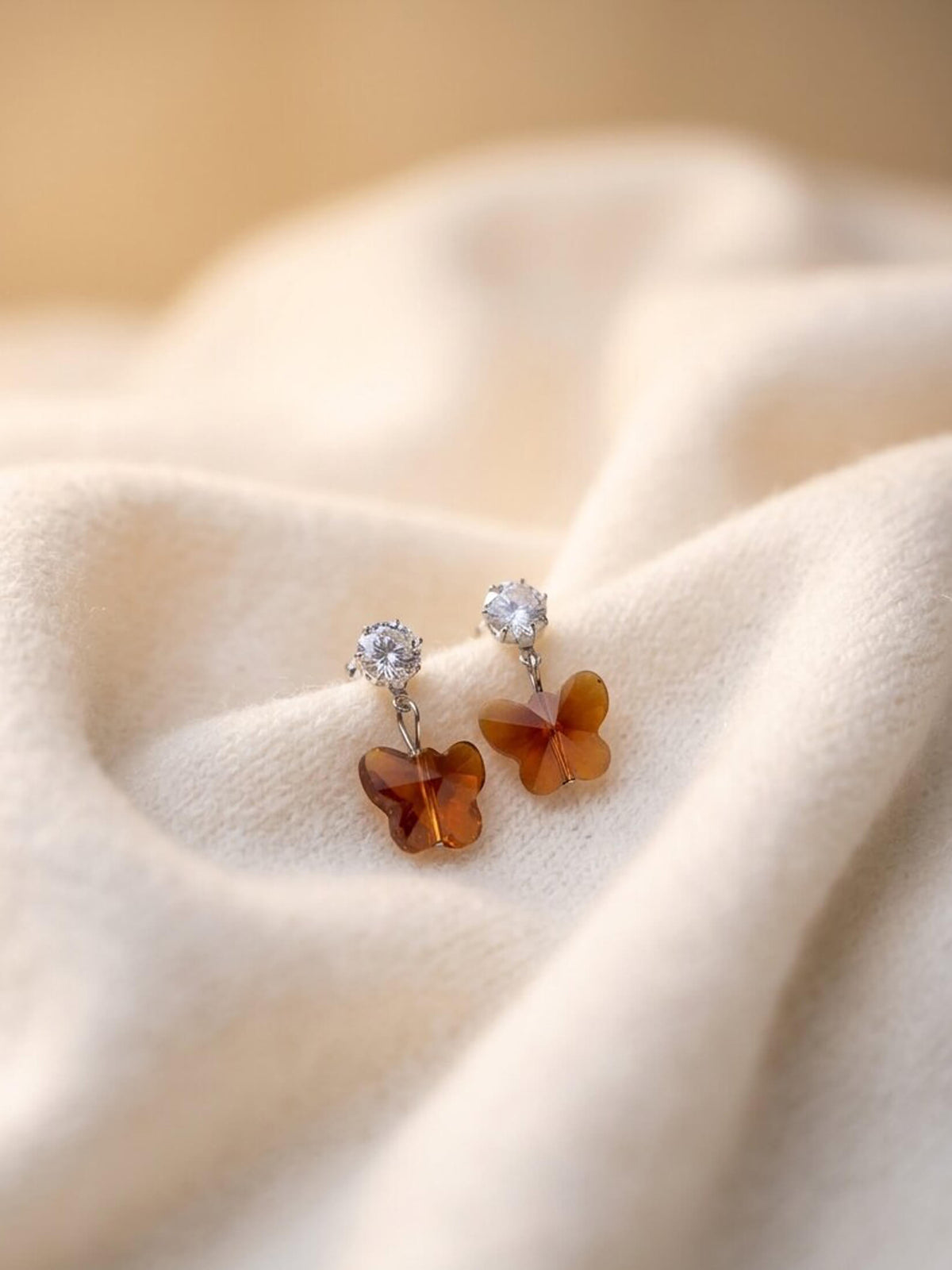 Brown butterfly  ad earrings