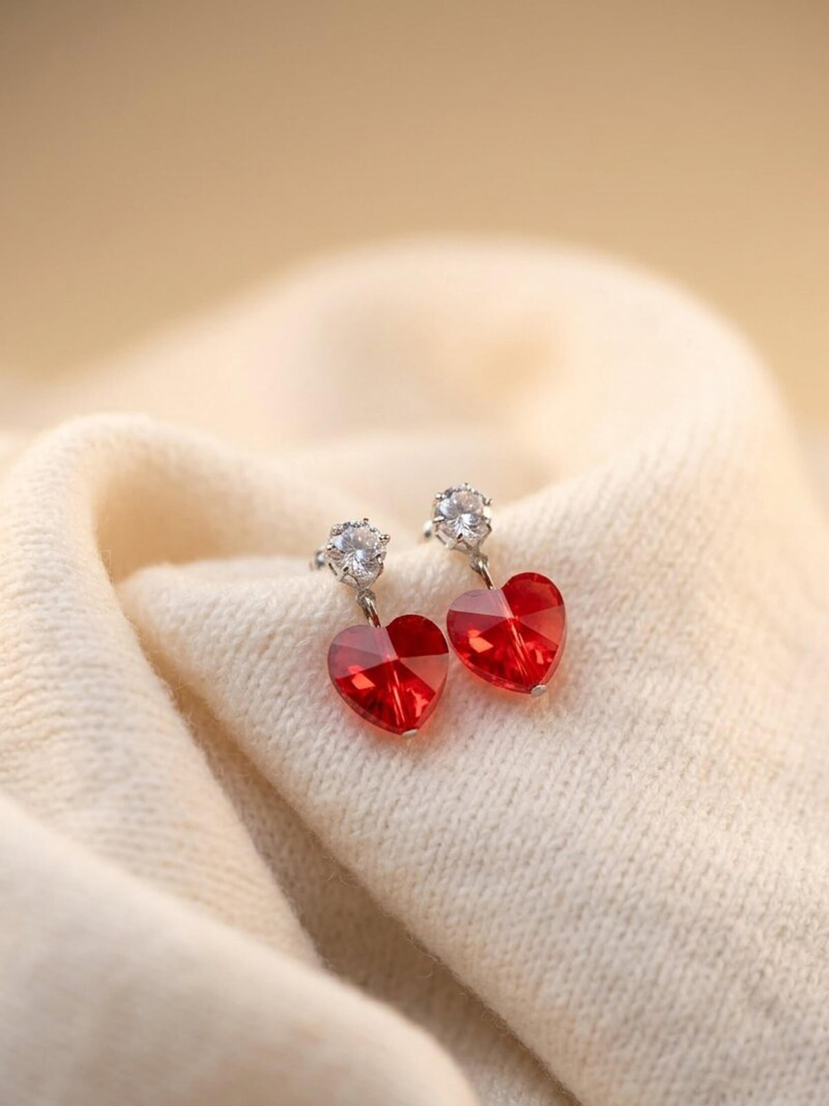 red herts ad earrings